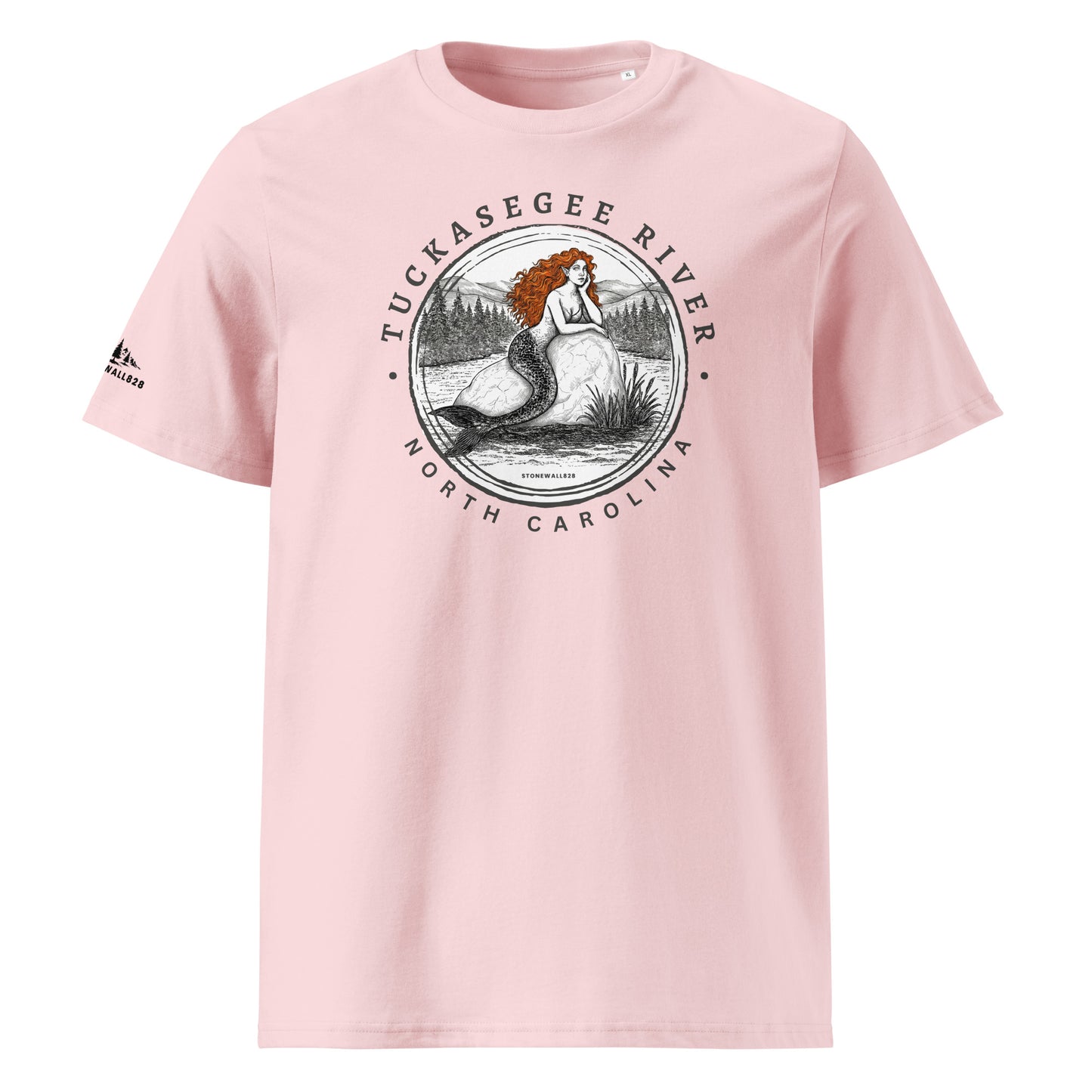 Product mockup, Featuring a mermaid perched on a rock in the heart of the Tuckasegee River, surrounded by mountains and trees, this heritage graphic tee brings a touch of magic to one of Western North Carolina's most beloved waterways.
