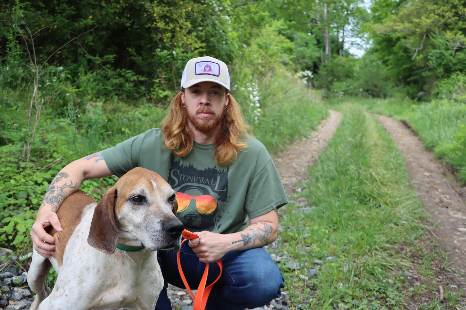 English coonhound with owner