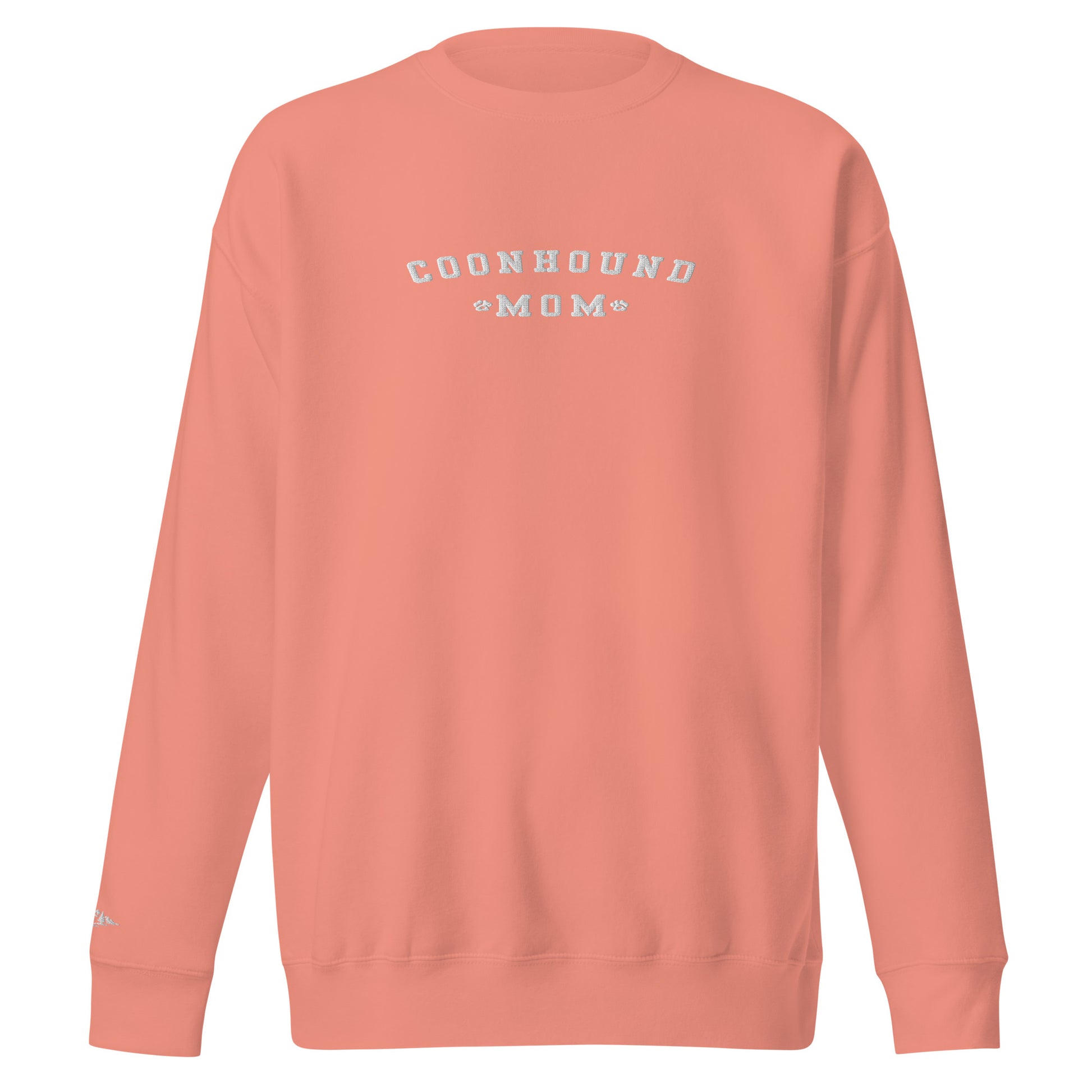 Product mockup. Featuring clean, bold typography paired with classic paw prints, this sweatshirt is a straightforward badge of honor for the women who know that life is just better with a coonhound by your side.