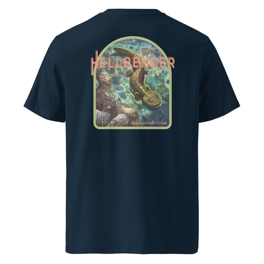 Product mockup. The front keeps it classic with our signature Stonewall828 logo over the chest. The back design takes you straight under the surface of a pristine mountain river, featuring a highly detailed hellbender resting on the stream bed, surrounded by river rocks and clear currents. Framed by the bold text "Appalachian Local" and "Hellbender," it’s a tribute to a true native that has called these waters home for millions of years.
