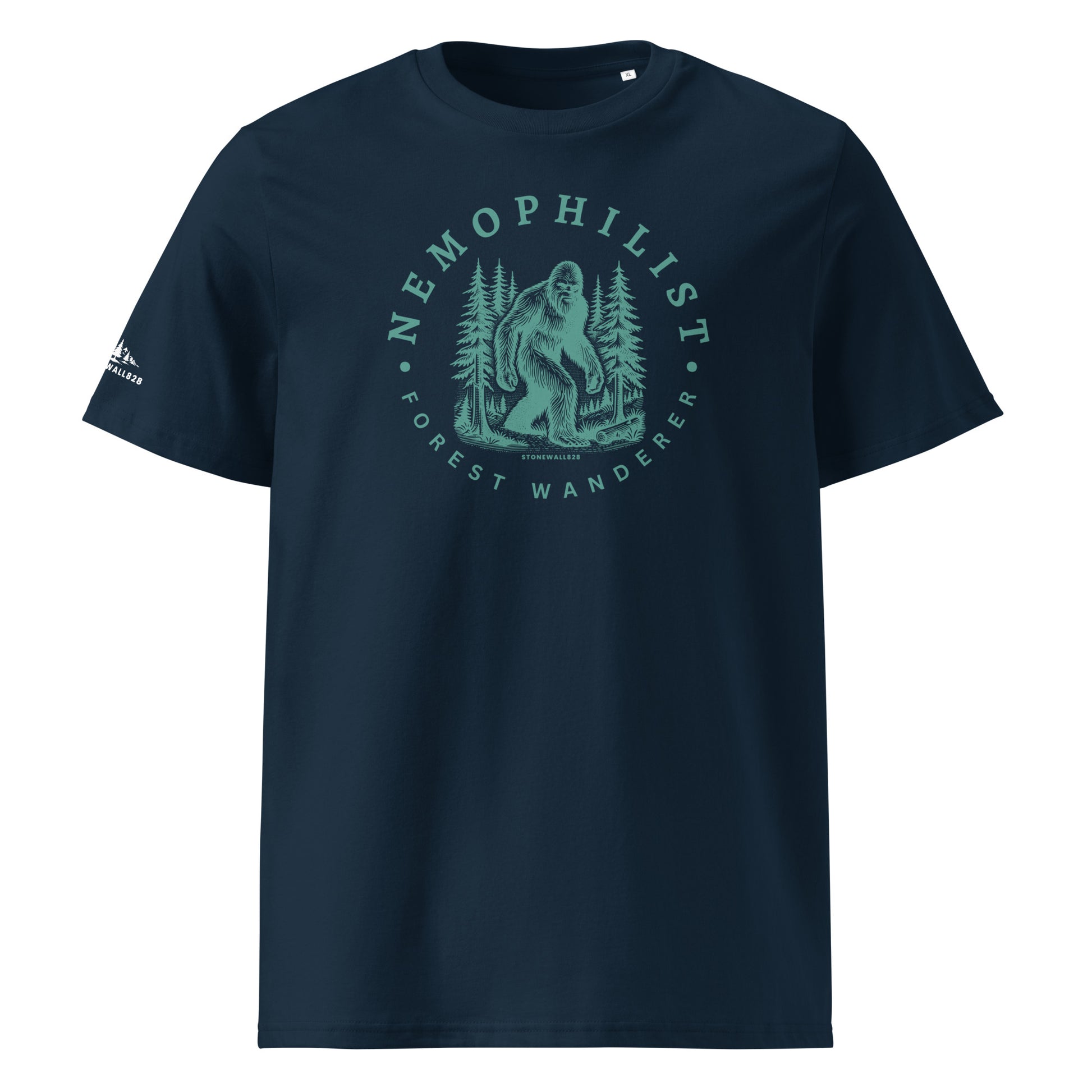 Product mockup. Inspired by the quiet-hearted and the forest-minded, this heritage graphic tee features Bigfoot moving through the pines with the easy confidence of something born from the ridgelines.