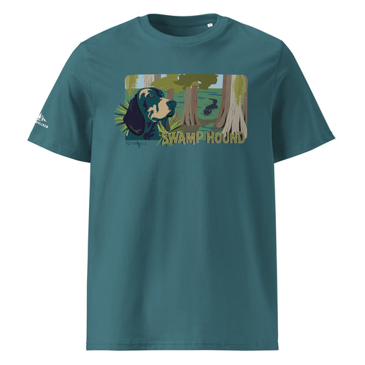 Product mockup, Featuring a focused hound framed by a dense swamp backdrop, the design hides a thrilling detail—a stealthy alligator quietly cruising through the murky water in the background. It's a nod to the rugged hounds and handlers who navigate the cypress knees, the dark water, and the wild predators of the deep south.