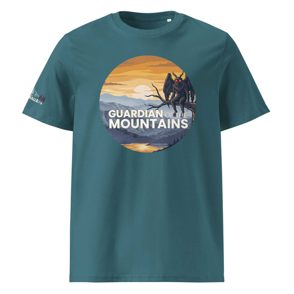 A teal short-sleeve crewneck t-shirt featuring a circular graphic on the chest of a dark dragon perched on a mountain peak at sunset, with the text 'GUARDIAN OF THE MOUNTAINS'. A small white logo is visible on the left sleeve.